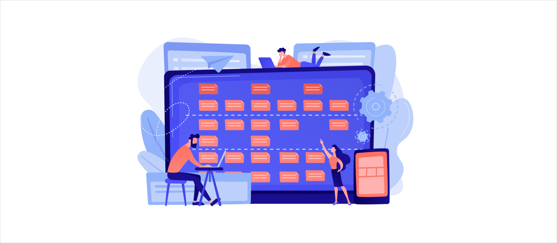 An image of a huge digital screen with some employees sitting around it