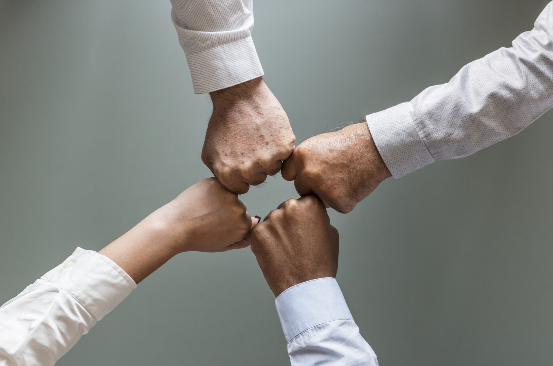 business-hands-joined-together-teamwork