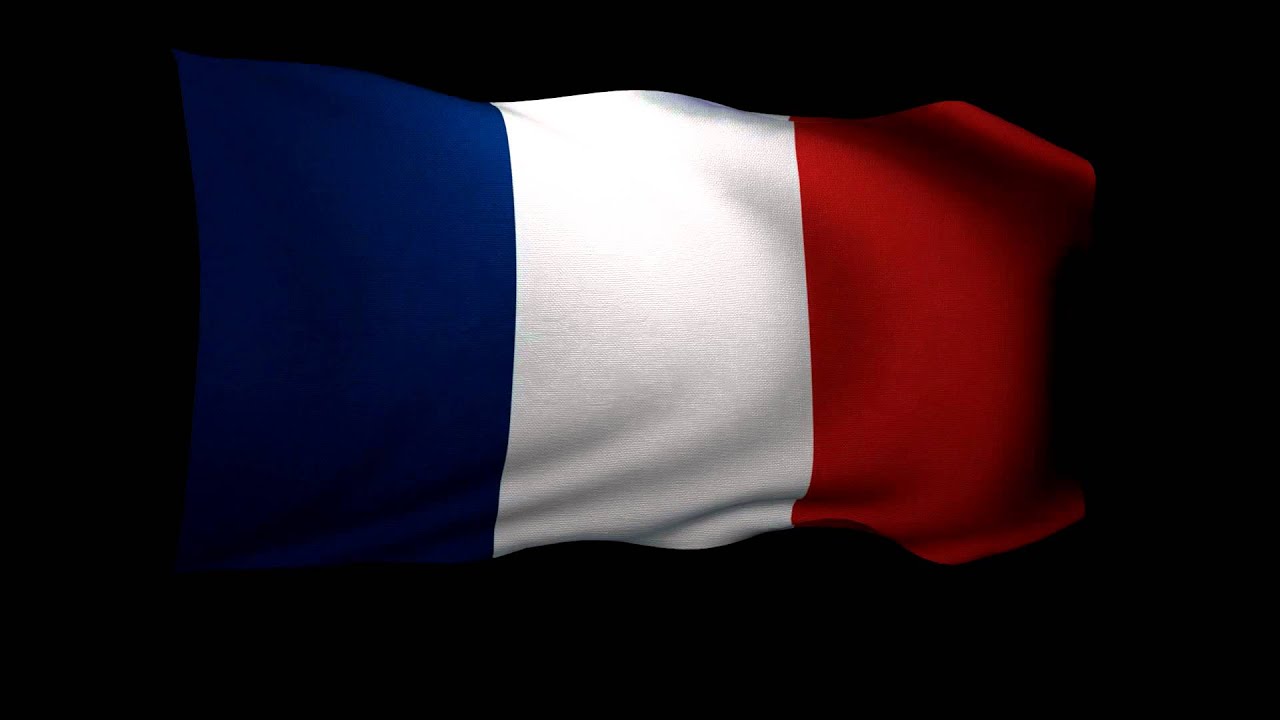 A close-up image of a fabric flag featuring three vertical stripes: blue on the left, white in the middle, and red on the right. The fabric appears smooth with gentle waves, giving it a dynamic and flowing appearance. The background is pitch black, highlighting the vibrant colors of the French national flag.