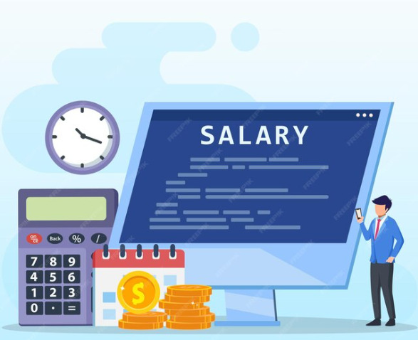 An image of a tine employee standing beside a huge computer screen, calculator and a payroll calendar