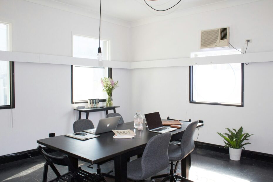 An image of an empty modern black and white office