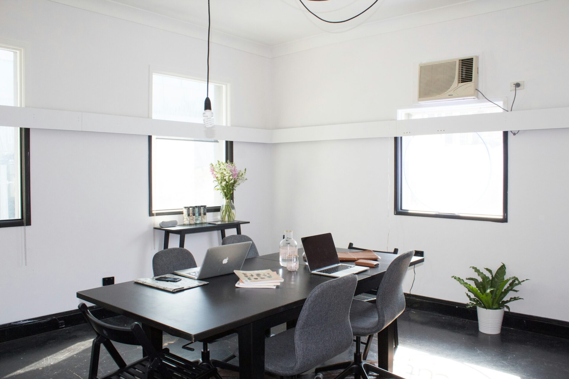 An image of an empty modern black and white office