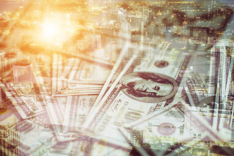 A composite image of a bustling city skyline at dusk with a warm, glowing sunset overlay, blended with close-up images of hundred-dollar bills, symbolizing the connection between urban economic growth and financial prosperity.